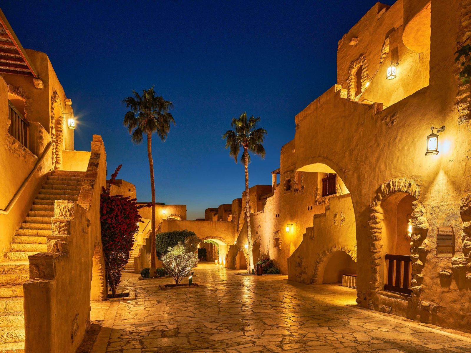 The resort village lit at night
